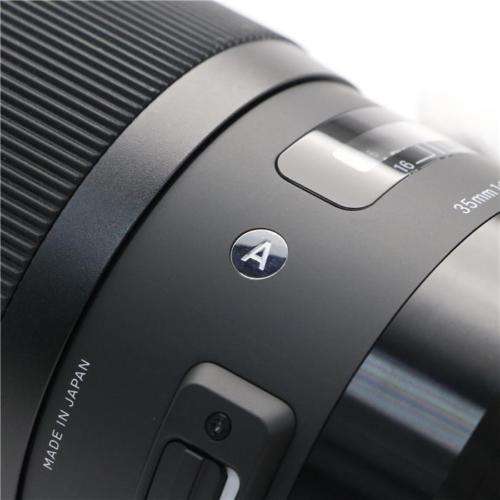 Sigma 35mm f/1.4 DG HSM Art Lens for Sony E 340965 - 7PC Accessory Bundle