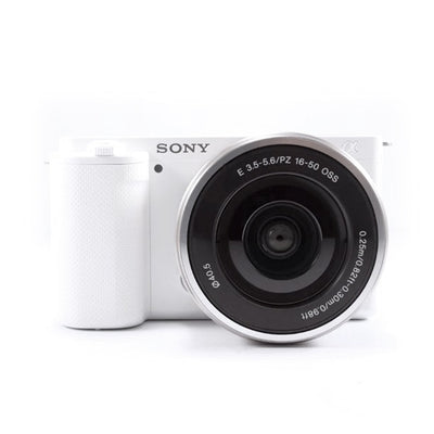 Sony ZV-E10 Mirrorless Camera with 16-50mm Lens (White) - 7PC Accessory Bundle